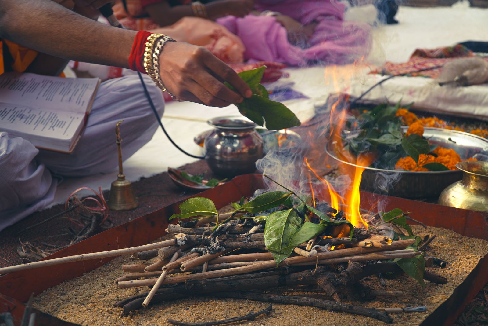 Offerings placed into the sacred ritual fire